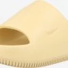 Nike Sportswear Sandales à Plateau Mule CALM SLIDE Femme Beige
